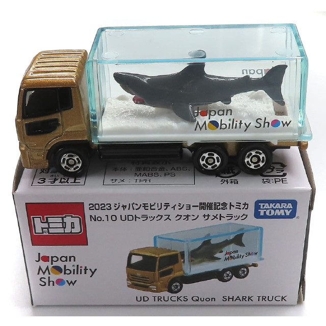 [MDL] UDトラックス クオン サメトラック(ゴールド×クリアブルー) 「トミカ 2023ジャパンモビリティショー 2023 No.10」 2023ジャパンモビリティショー開催記念 完成品 ミニカー タカラトミー
